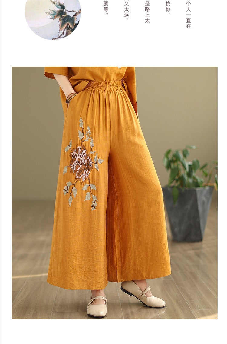 Spring and summer 2025 new round neck short sleeve embroidered cotton and linen top elastic waist nine casual wide leg pants two-piece set