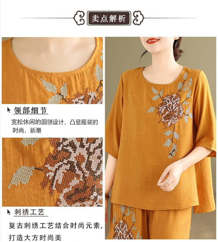 Spring and summer 2025 new round neck short sleeve embroidered cotton and linen top elastic waist nine casual wide leg pants two-piece set