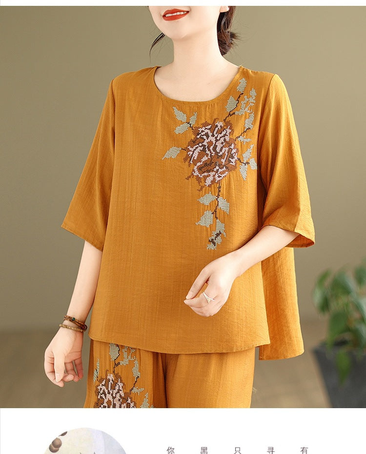 Spring and summer 2025 new round neck short sleeve embroidered cotton and linen top elastic waist nine casual wide leg pants two-piece set