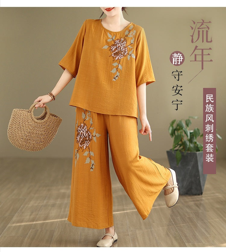 Spring and summer 2025 new round neck short sleeve embroidered cotton and linen top elastic waist nine casual wide leg pants two-piece set