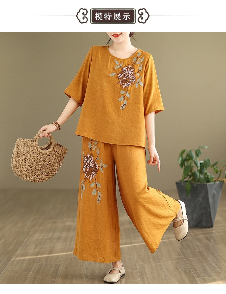 Spring and summer 2025 new round neck short sleeve embroidered cotton and linen top elastic waist nine casual wide leg pants two-piece set