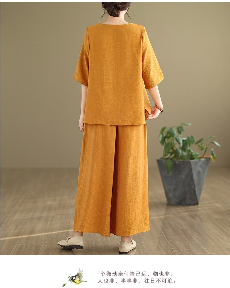 Spring and summer 2025 new round neck short sleeve embroidered cotton and linen top elastic waist nine casual wide leg pants two-piece set