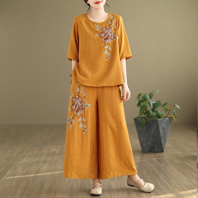 Spring and summer 2025 new round neck short sleeve embroidered cotton and linen top elastic waist nine casual wide leg pants two-piece set