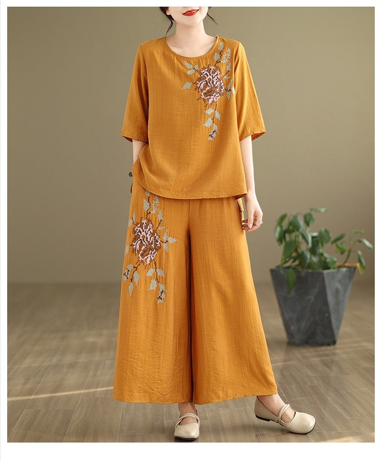 Spring and summer 2025 new round neck short sleeve embroidered cotton and linen top elastic waist nine casual wide leg pants two-piece set