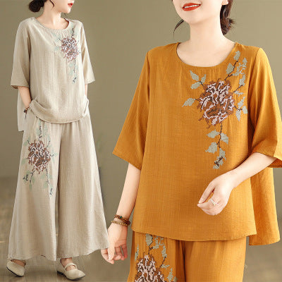 Spring and summer 2025 new round neck short sleeve embroidered cotton and linen top elastic waist nine casual wide leg pants two-piece set